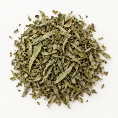 Loose dried lemon verbena on a warm-white background.
